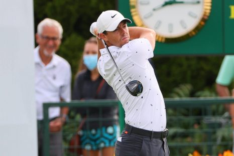 Golf player looks after his tee shot during a golf game