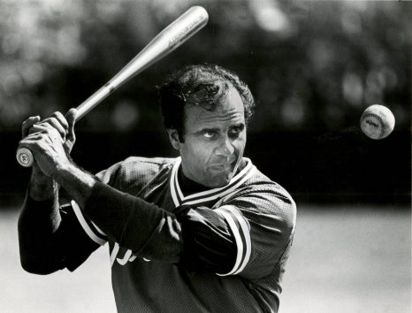 Joe Torre takes a turn hitting fungoes