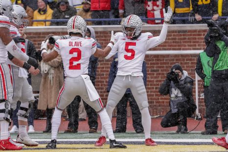 American football players celebrate a touchdown