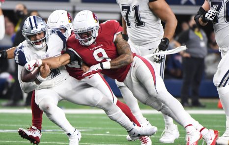 American football player scores a touch down during a match