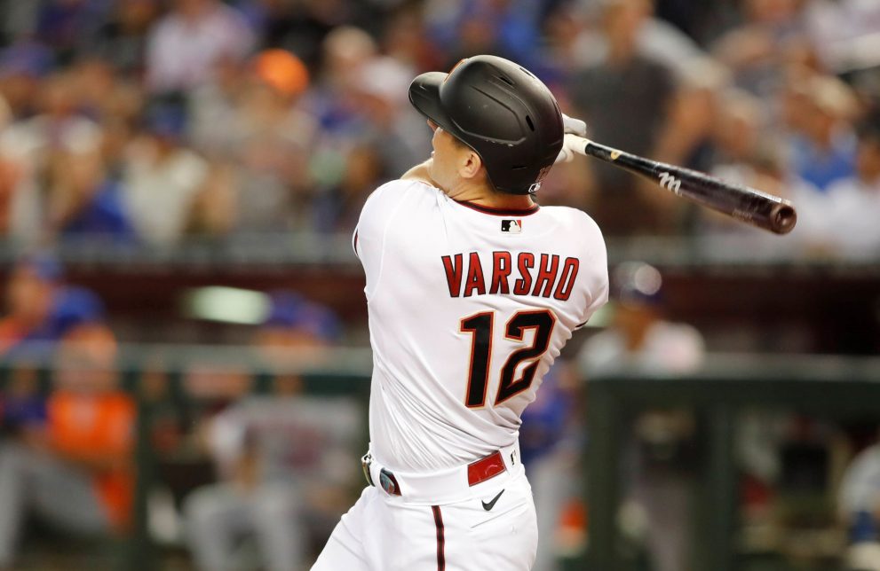 Baseball player hits the ball during a game