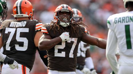 American football player celebrates after scoring