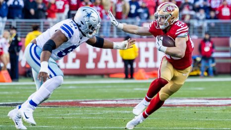 American Football player runs to a touch down during a match