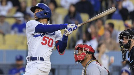 Baseball player hits the ball during a baseball game